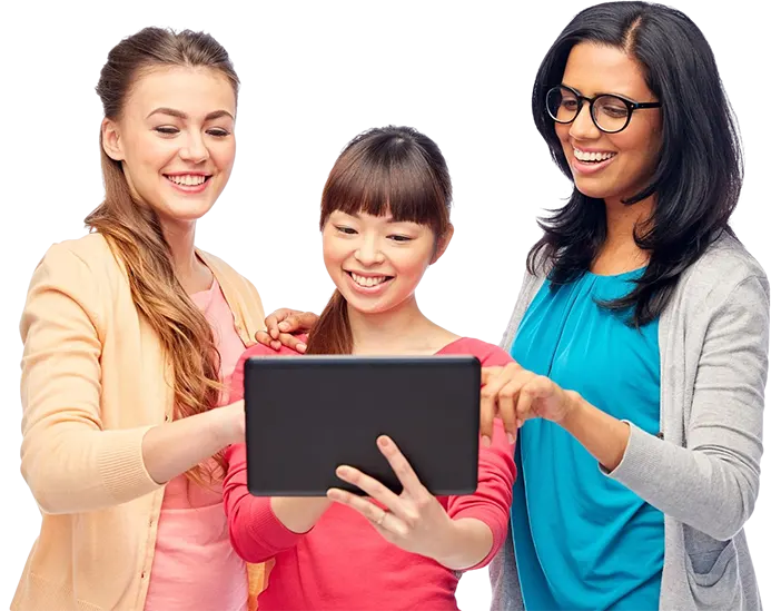 three women looking at the tablet